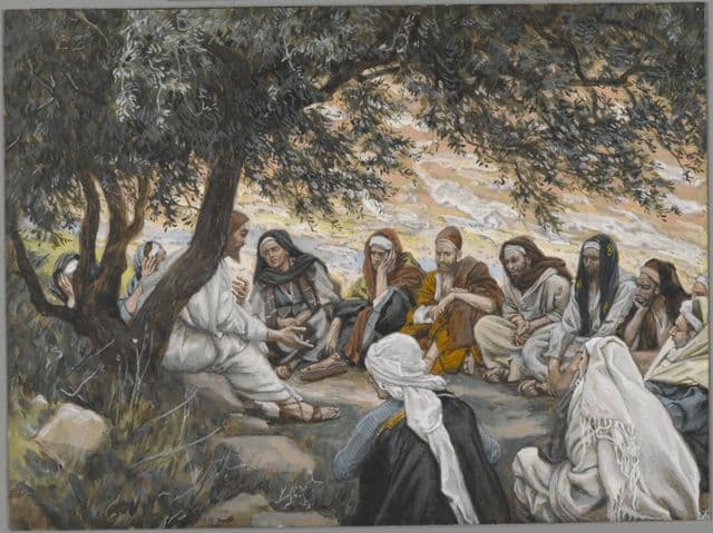 Jesus stands before gathered apostles in a sparse landscape, instructing them with calm authority while they cluster attentively around him.