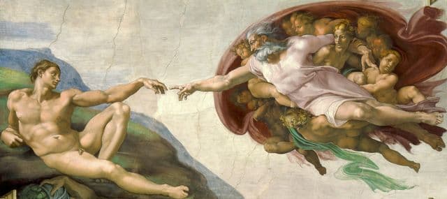God and Adam reach toward each other across a tiny gap, their hands nearly touching; Adam reclines on earth while God surges forward in a mantle of figures.
